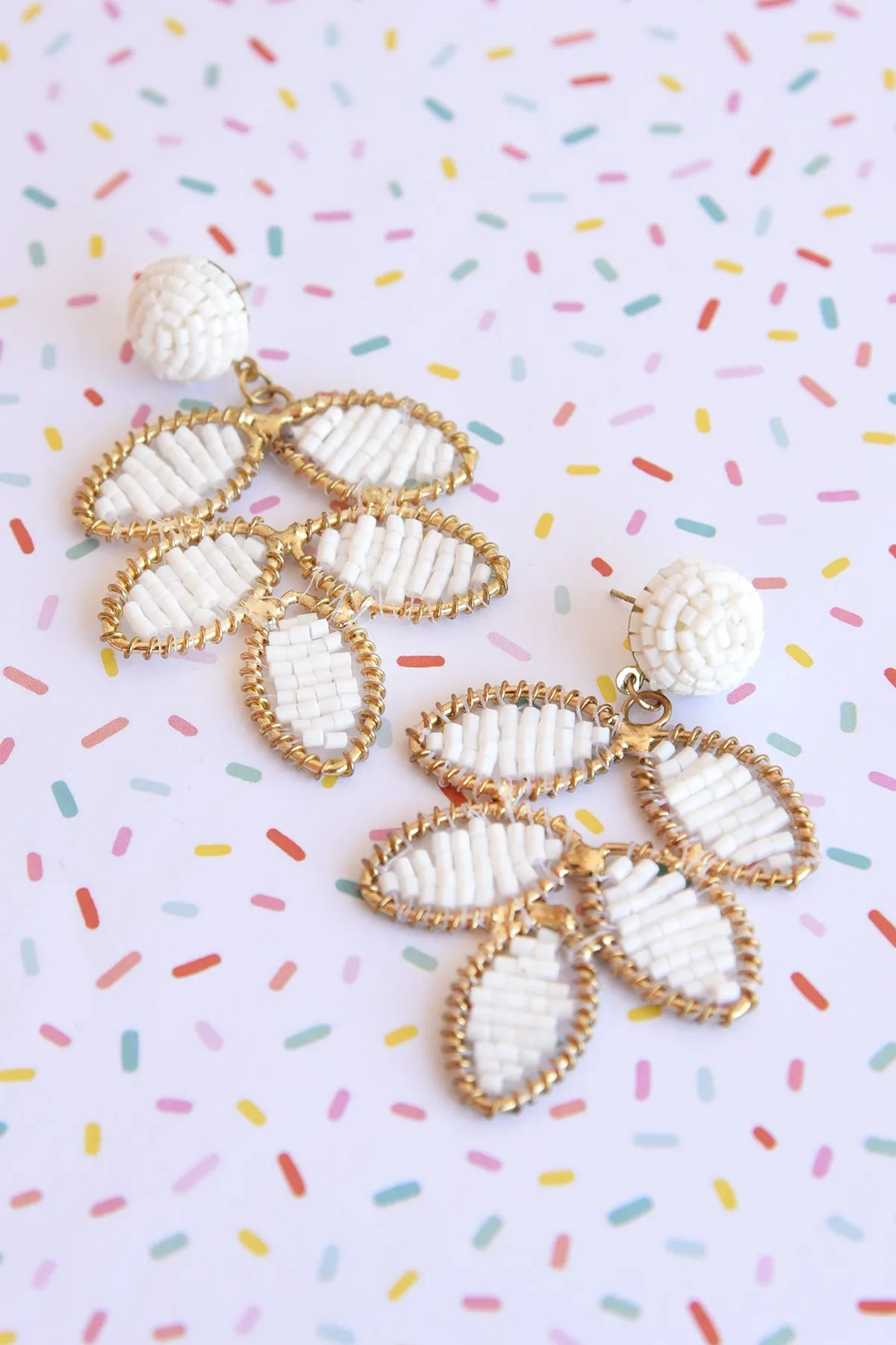 WHITE BEADED LEAF EARRINGS